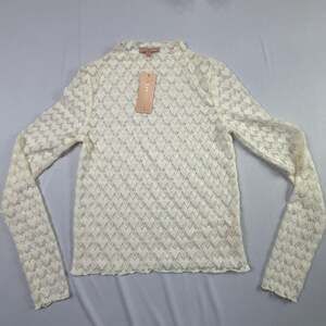 Evolutionary Cream Heart Lace Mock Neck Long Sleeve Top